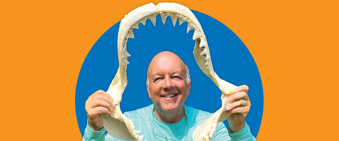 Image of author&apos;s holding shark jaw